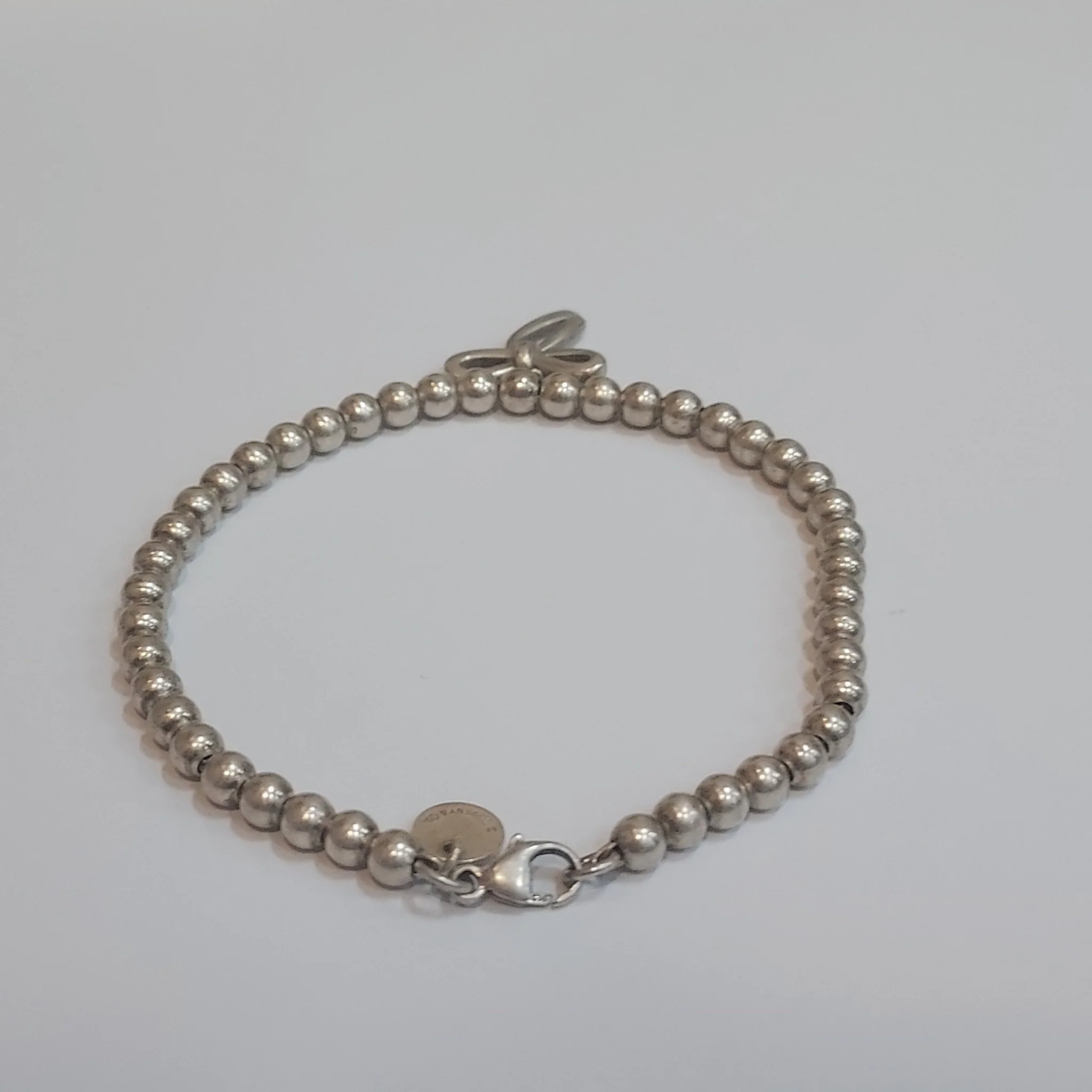 Tiffany & Co. Sterling Silver Bow Charm Bracelet - Image 3