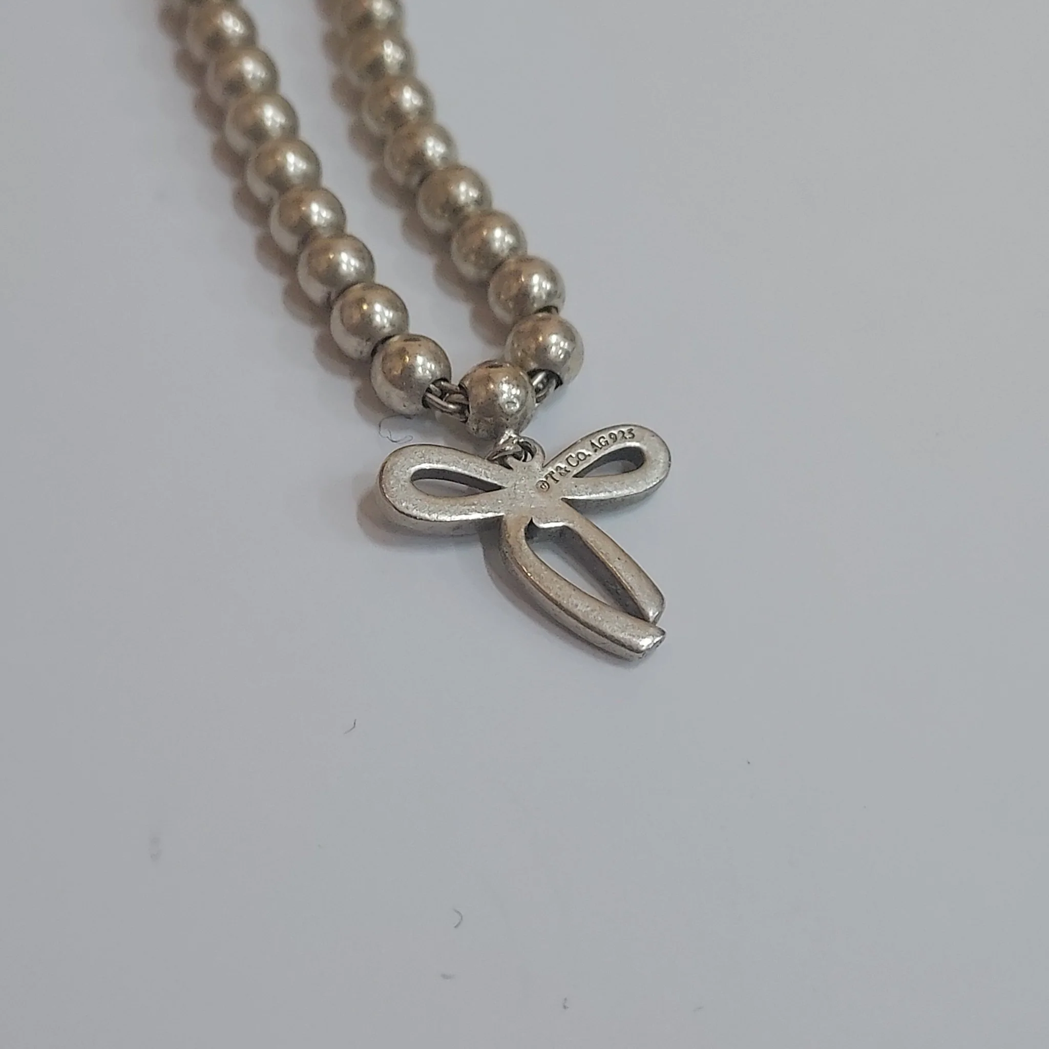 Tiffany & Co. Sterling Silver Bow Charm Bracelet - Image 4